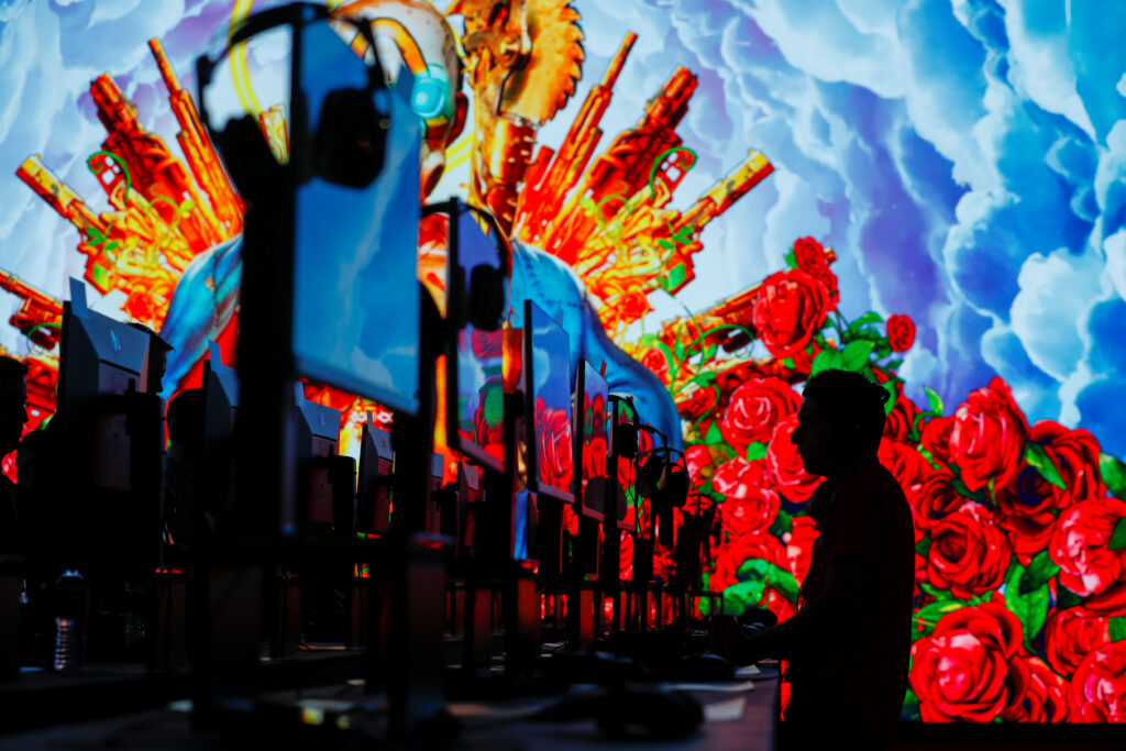 Attendees test out new games during the opening day of E3, the annual video games expo revealing the latest in gaming software and hardware in Los Angeles, California, U.S., June 11, 2019.