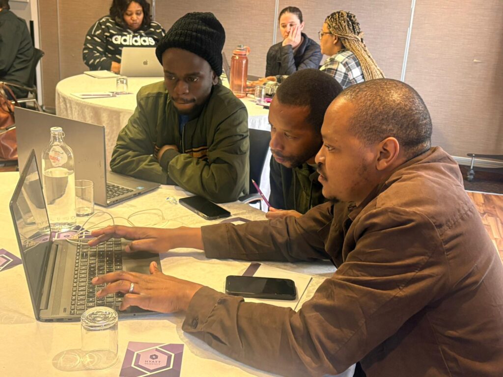 Journalists working during an AI adoption workshop