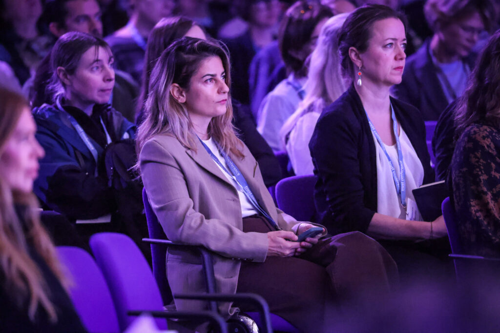 Delegates listen to speakers at Trust Conference
